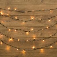Гирлянда светодиодная "Твинкл Лайт" 15м 120LED тепл. бел. 6.9Вт 220-240В IP20 с контроллером 8 режимов провод ПВХ темн. зел. Neon-Night 303-056 - УПС инжиниринг